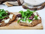 Pizzette integrali con rucola e olive